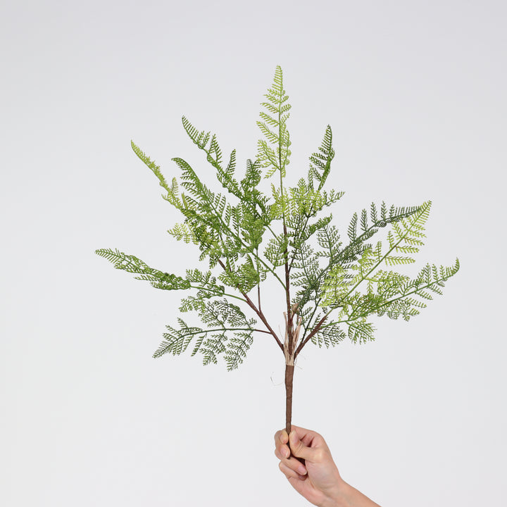 Artificial decorative fern branch