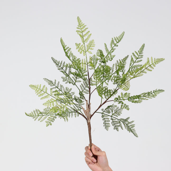 Artificial decorative fern branch