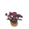 Burgundy artificial roses in a gold porcelain pot