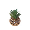 Small artificial cactus in a golden porcelain pot